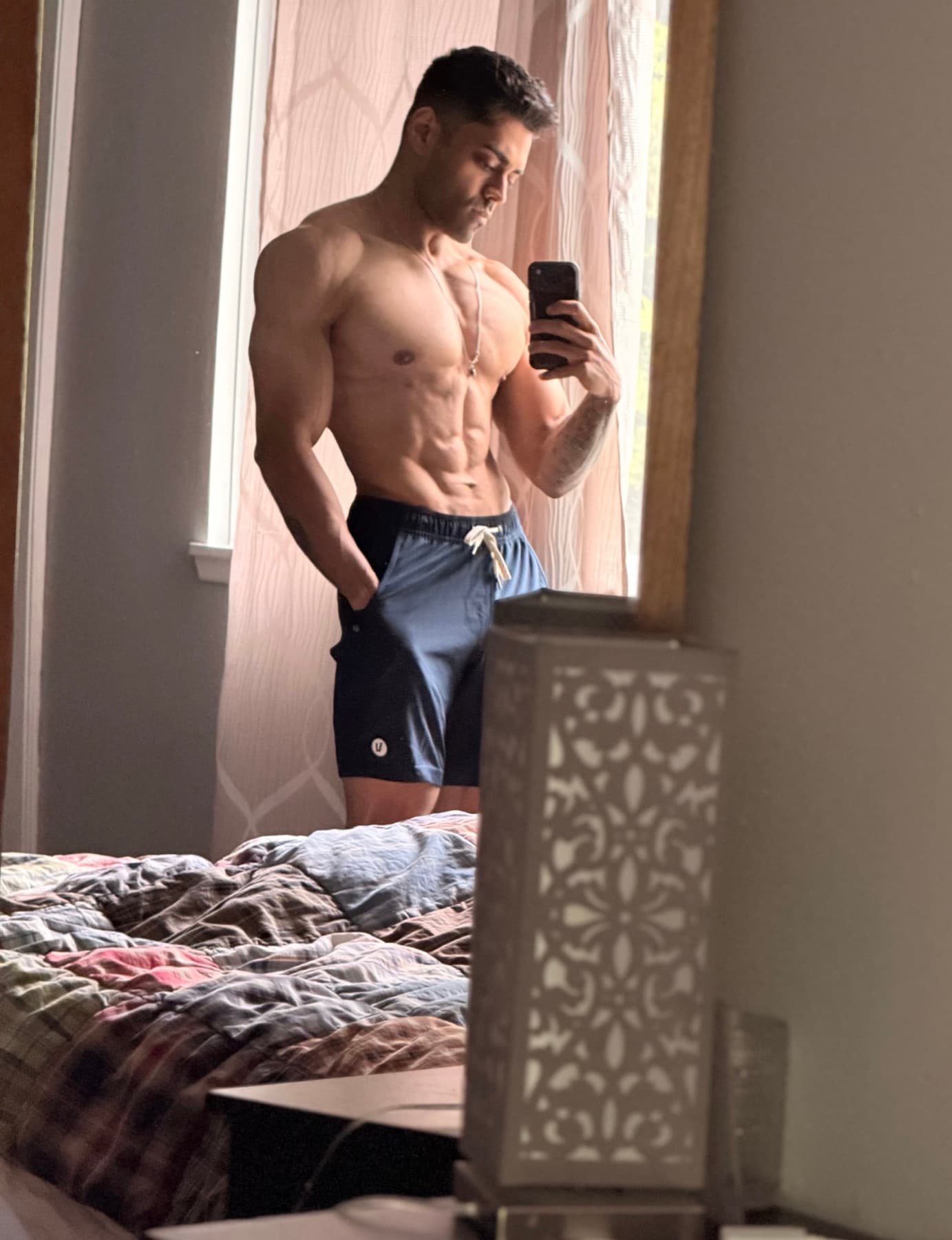 Close-up mirror selfie portrait of Abe Seth.